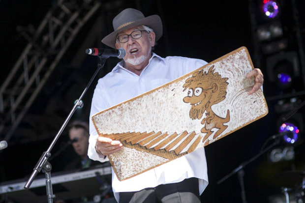 Rolf Harris playing at Camp Bestival